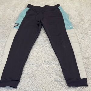 Nike ELITE SIZE M  Kids Black and Light Blue Joggers SMALL MARK ON LEG, NO HOLES